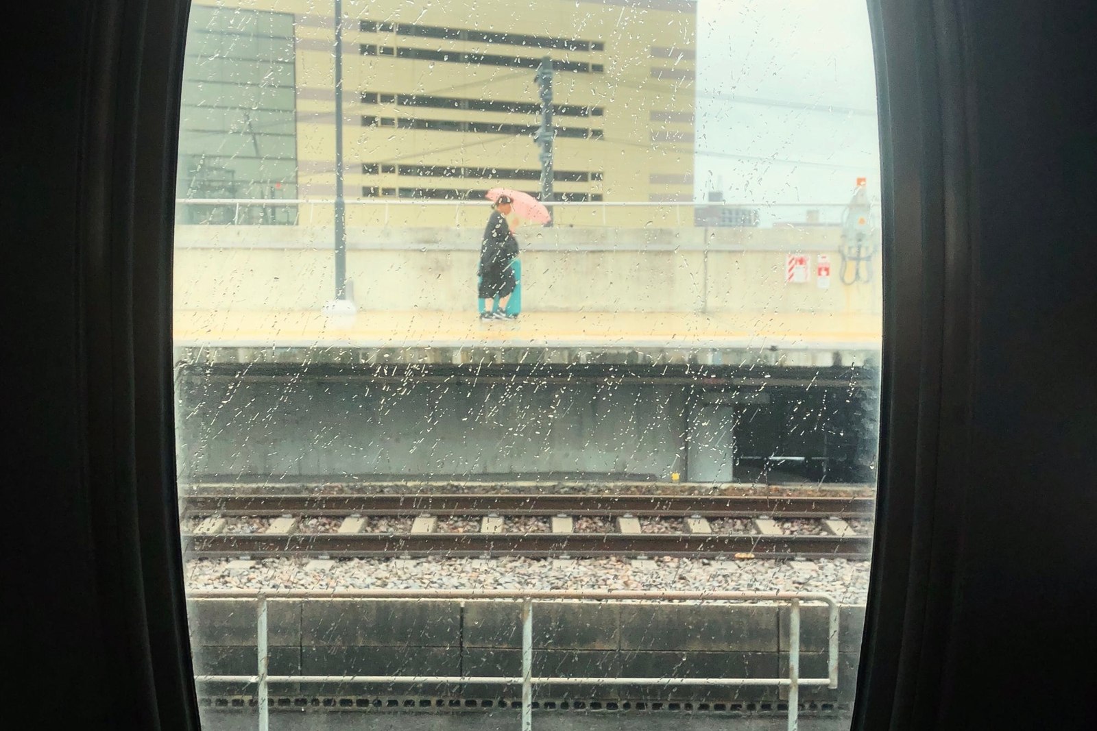 View Through A Train Window In The Rain