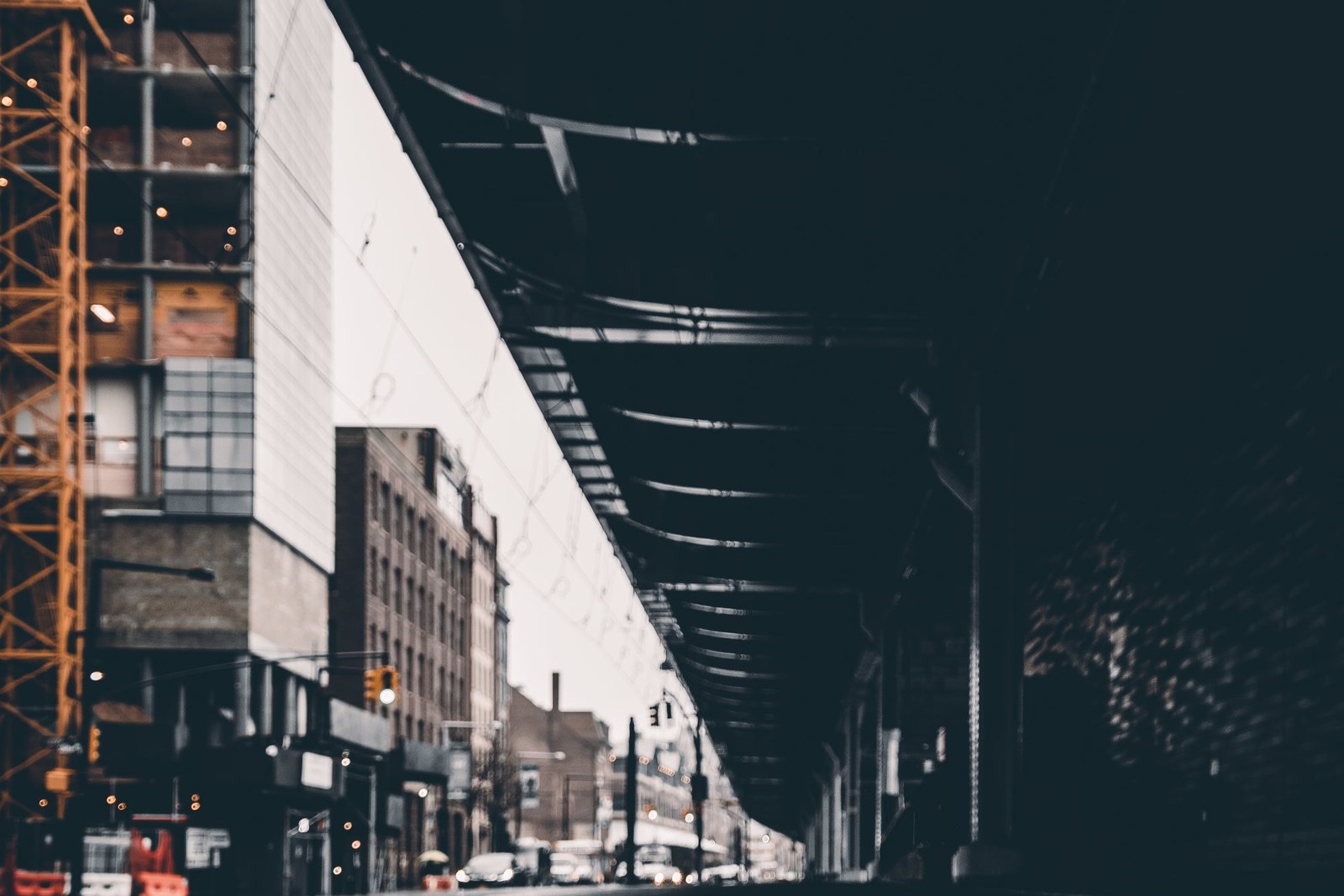 Puddle Water Reflects Urban Bridge
